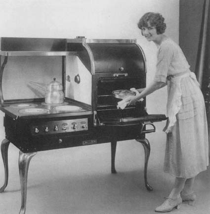 An ad from the 1920s featuring a new General Electric convenience: the electric stove. Reproduced by permission of AP/Wide World Photos.