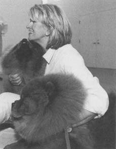 Martha Stewart with her two Chinese Chow Chow dogs, Chin Chin and Paw Paw. Reproduced by permission of AP/Wide World Photos.