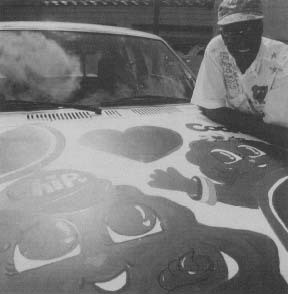 Wally Amos took his love of cookies to the extreme: he even had a chocolate chip cookie car. Reproduced by permission of Corbis Corporation (Bellevue).