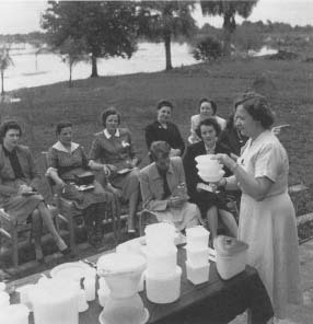 In the 1940s and 1950s, the Tupperware party was the number-one way to purchase Tupperware products. Reproduced by permission of Archive Photos, Inc.
