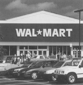 Wal-Mart is the largest retailer in the world, and, as of 2001, the largest corporation. Reproduced by permission of Corbis Corporation (Bellevue).